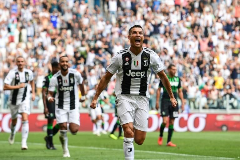 Double delight: Cristiano Ronaldo scored his first goals for Juventus in a 2-1 over Sassuolo in Turin