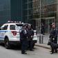 Police stand outside the Time Warner Building on October 24, 2018, after an explosive device was delivered to CNN's New York bureau