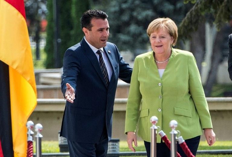 German Chancellor Angela Merkel (R) has tried to help Macedonia's Prime Minister Zoran Zaev (L) win a referendum on changing the country's name so it can pursue EU membership