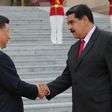 Venezuelan President Nicolas Maduro, shown here with Chinese counterpart Xi Jinping, says China agreed to oil industry financing