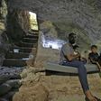 A Syrian family hides in a custom-built cave in Idlib province as negotiations continue to avoid a massive government offensive on the area