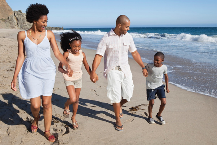 Black family on the beach (Jumia Travel)