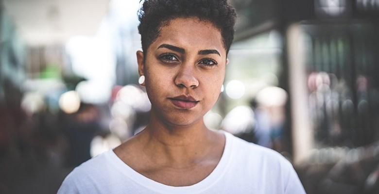 Woman stares blankly into space [Credit: All This]