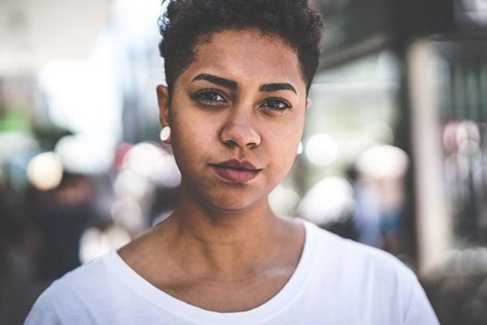 Woman stares blankly into space [Credit: All This]