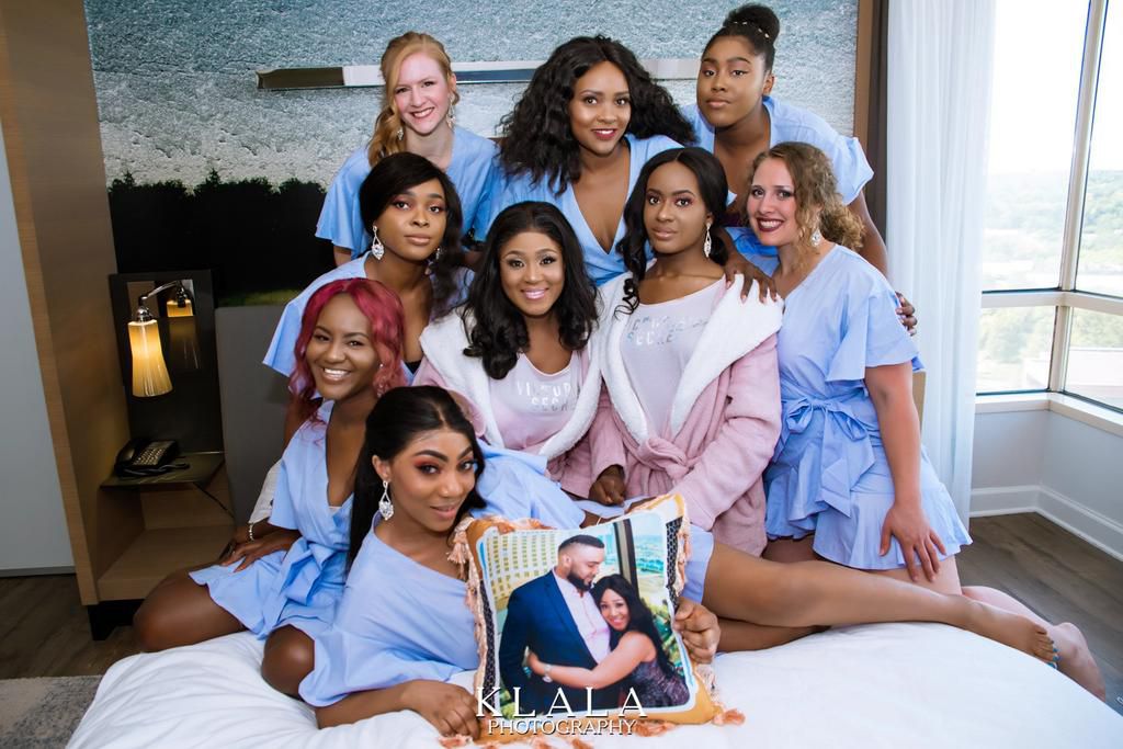 Yomola and Peter's wedding pictures are in from the other side of the world, and they're brimming with surreal love and laughter!