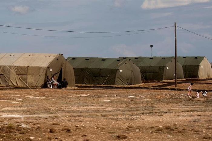 Member of a group of migrants (pictured October 2015), who have been living in a military facility at Britain's Dhekelia garrison in Cyprus since the boat in which they were travelling to Italy foundered in 1998, will be allowed to settle in Britain