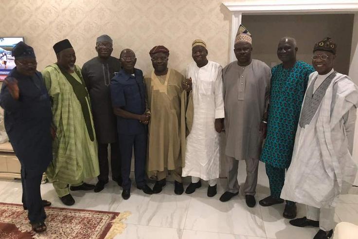 Omisore poses for pictures with APC chieftains after a meeting in Osogbo