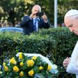 Pope Francis lays a bouquet of yellow roses at the foot of the Vilnius ghetto memorial and pays a silent tribute to Holocaust victims