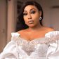 Rita Dominic looks sensational in white for Lala Akindoju and Chef Fregz nuptials