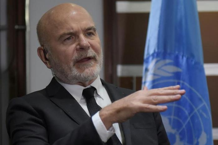 Michel Forst, UN Special Rapporteur on the situation of human rights defenders, speaks during an interview with AFP in Bogota on December 3, 2018