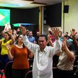 Faithful pray at an evangelical church in Brasilia for the recovery of the health of Brazilian right-wing presidential candidate Jair Bolsonaro, who suffered a knife attack during the campaign