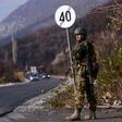 A soldier of the NATO-led peacekeeping mission in Kosovo (KFOR) secures the area near the village of Rudare in northern Mitrovica during a protest of Kosovo Serbs on November 23, 2018