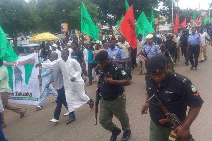 ___8879965___2018___9___20___14___Armed-policemen-following-Free-Zakzaky-protesters-in-Kaduna1-1