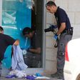 Israeli forensic policemen inspect the site where an Israeli man was fatally stabbed by a Palestinian near a mall at the Gush Etzion junction near Bethlehem in the occupied West Bank on September 16, 2018