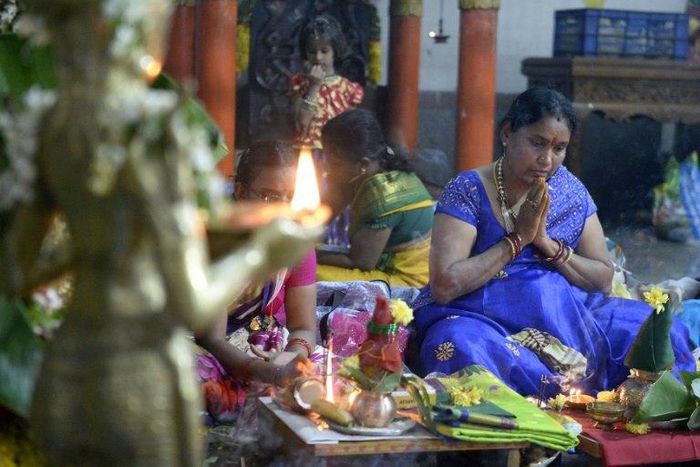 The Supreme Court in India has overturned a rule that forbade the majority of women from entering one of the holiest temples for Hindus
