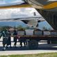 Indonesian military officers are evacuating the bodies of those killed in restive Papua to the town of Timika