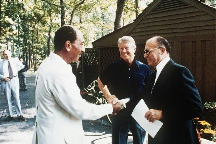 Jimmy Carter with Egypt's Anwar Sadat (left) and Israel's Menachem Begin (right) on September 6, 1978 at Camp David