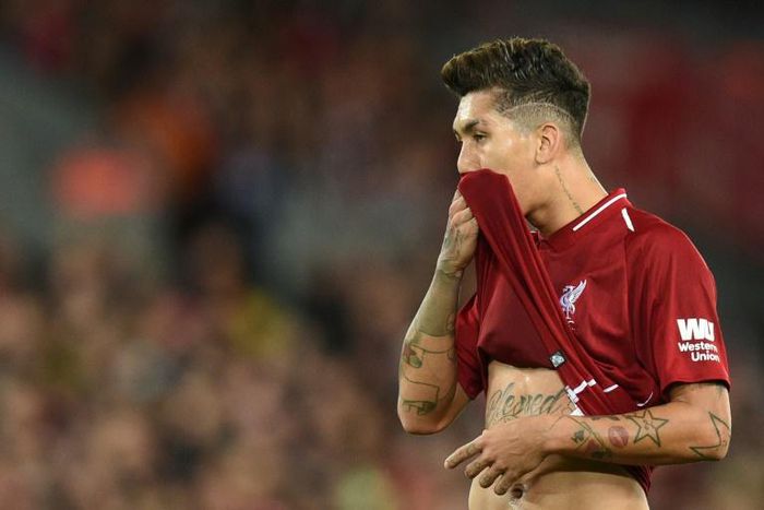 Liverpool's Brazilian midfielder Roberto Firmino (pictured December 2, 2018) helped his team make a comeback at Burnley after the hosts took an unexpected lead
