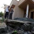 Libyans gather at the site of a mortar explosion in the capital Tripoli on August 30, 2018