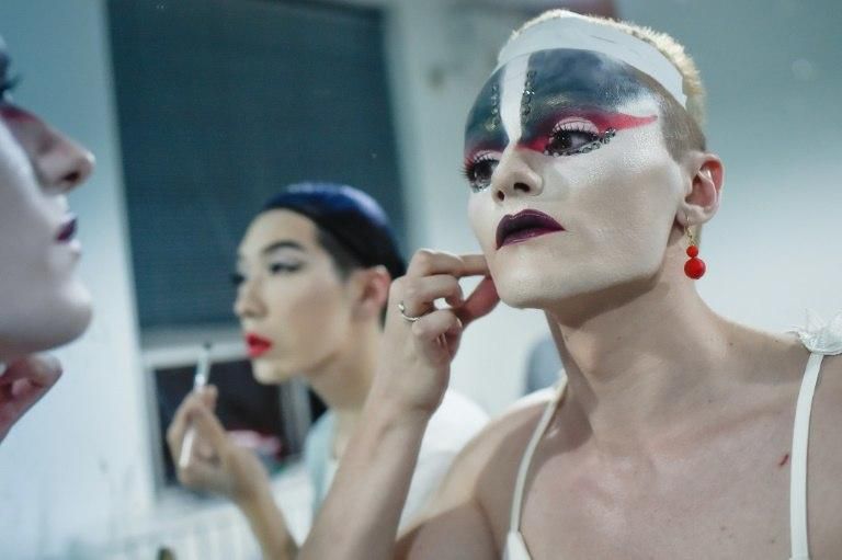 Chinese drag queens perform in dimly-lit local nightclubs where they do their makeup and hair themselves