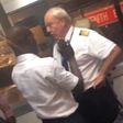 An airline staff was having a conversation with a pilot before an angry passenger threw two slaps down his way.