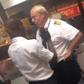 An airline staff was having a conversation with a pilot before an angry passenger threw two slaps down his way.