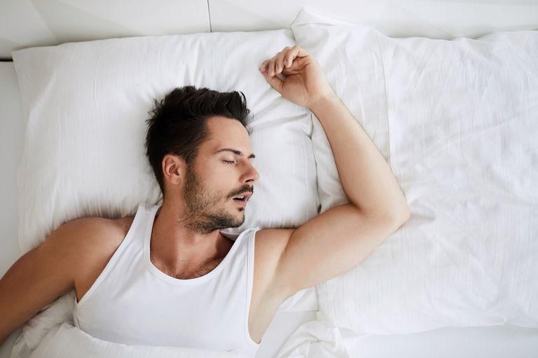 ___8883615___2018___9___21___10___top-view-of-young-attractive-man-sleeping-with-royalty-free-image-996101106-1537481889