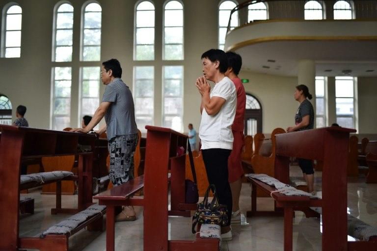 The standoff between Beijing and the Vatican has split China's roughly 12 million Catholics