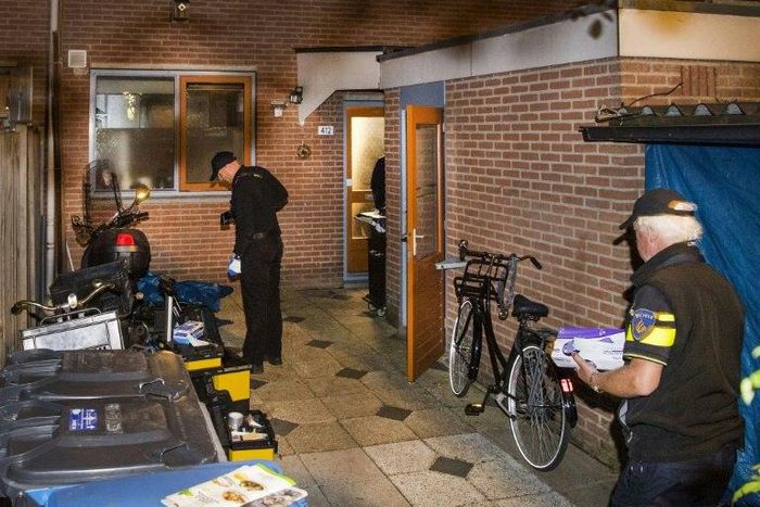Dutch police officers search the Arnhem home of one of the people suspected of wanting to carry out a "major" terror attack in the Netherlands