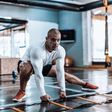 ___8904818___2018___9___26___16___man-stretching-in-the-gym-before-exercise-royalty-free-image-867348060-1537907156