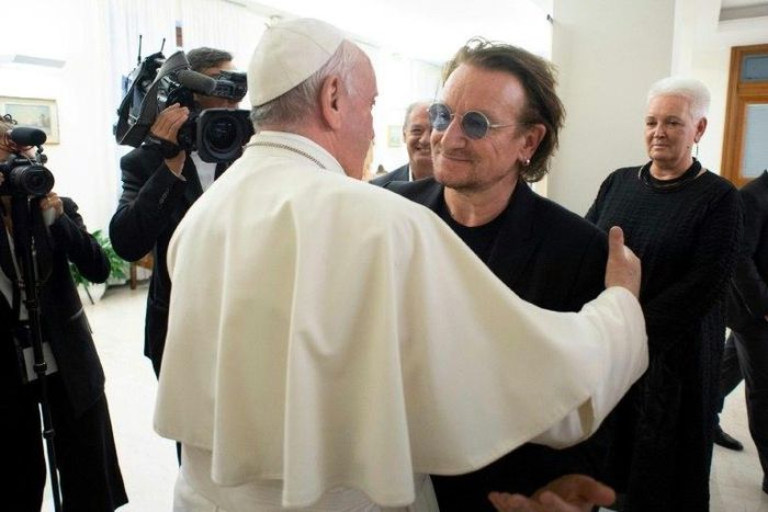 Pope Francis meets U2 singer Bono at the Vatican, where they discussed the abuse scandal rocking the Catholic Church