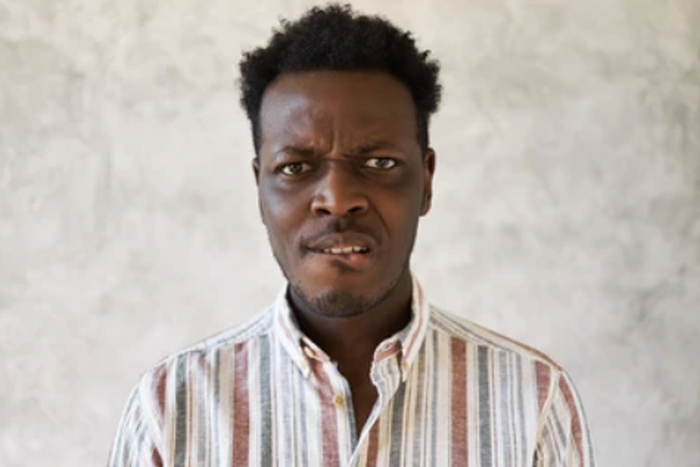 A person biting the lips