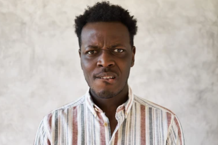 A person biting the lips