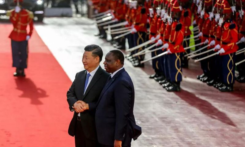Le président Macky Sall en compagnie de son homologue Xi Jinping lors d'une visite de ce dernier au Sénégal