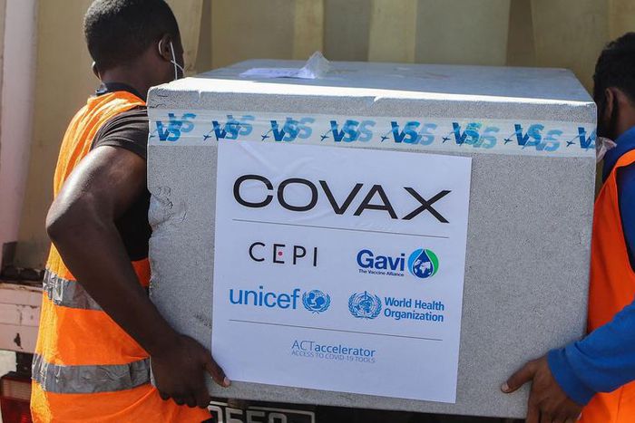 Workers load boxes of COVID-19 vaccines for COVAX in Antananarivo, Madagascar.