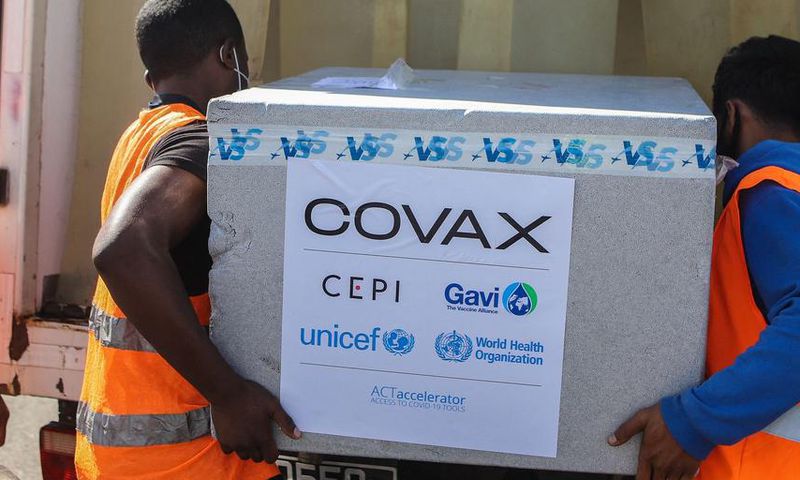 Workers load boxes of COVID-19 vaccines for COVAX in Antananarivo, Madagascar.