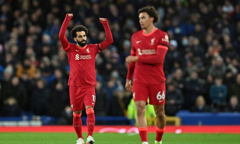 Derby delight: Mohamed Salah (left)scored twice as Liverpool beat Everton