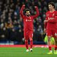 Derby delight: Mohamed Salah (left)scored twice as Liverpool beat Everton