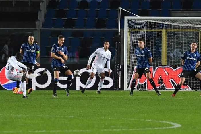 Real Madrid's French defender Ferland Mendy (L) scored the only goal against Atalanta in Bergamo.