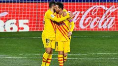 Lionel Messi and Jordi Alba celebrate Barca's opening goal against Huesca