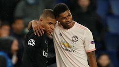 Kylian-Mbappé avec Marcus Rashford pendant un match de LdC entre le PSG et Man United