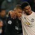 Kylian-Mbappé avec Marcus Rashford pendant un match de LdC entre le PSG et Man United