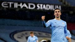 On the rise: Ferran Torres (right) scored Manchester City's second as they moved up to fifth in the Premier League