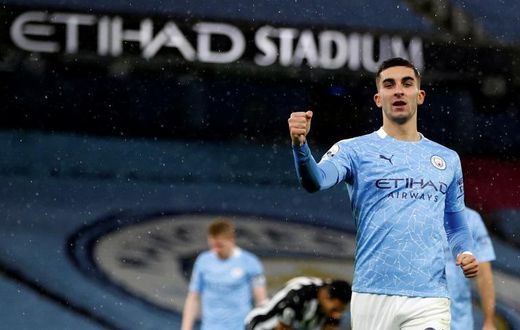 On the rise: Ferran Torres (right) scored Manchester City's second as they moved up to fifth in the Premier League
