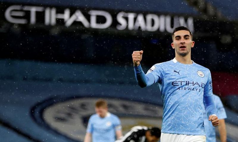 On the rise: Ferran Torres (right) scored Manchester City's second as they moved up to fifth in the Premier League