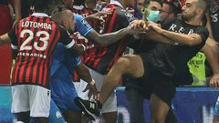 The trouble started when Marseille's Dimitri Payet (2nd L) reacted to being pelted with bottles by the Nice supporters