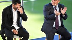 A tearful Sergio Aguero (L) with Barcelona president Joan Laporta at a press conference at the Camp Nou to announce his retirement from football on Wednesday