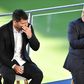 A tearful Sergio Aguero (L) with Barcelona president Joan Laporta at a press conference at the Camp Nou to announce his retirement from football on Wednesday