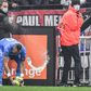 Marseille's French midfielder Dimitri Payet (left) was hit by a bottle of water thrown from the stands during the Ligue 1 match against Lyon
