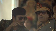 Jerry Rawlings avec l'ancien guide libyen Muammar Kadhafi in 1987